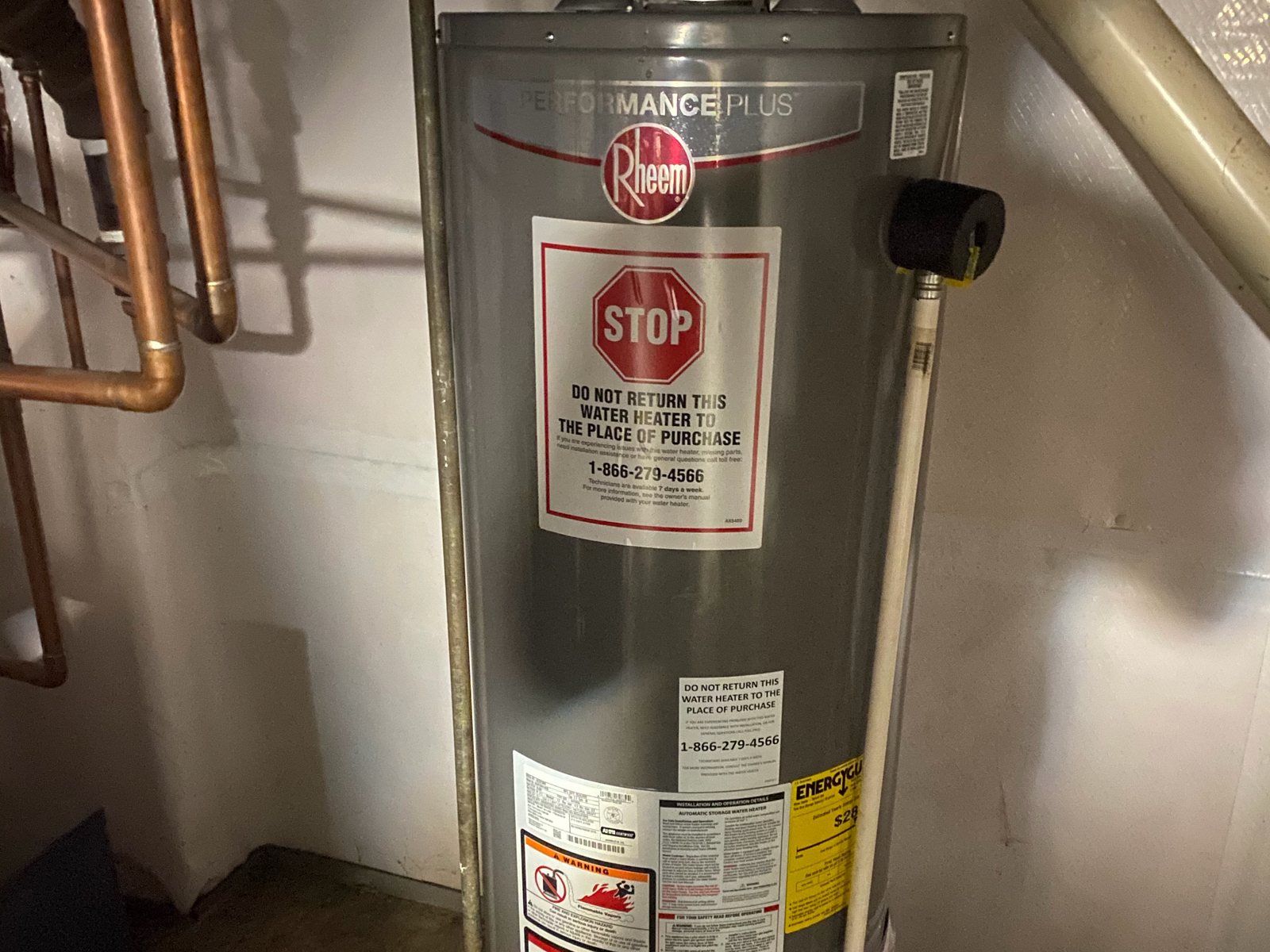 Gas tank water heater installed in a basement