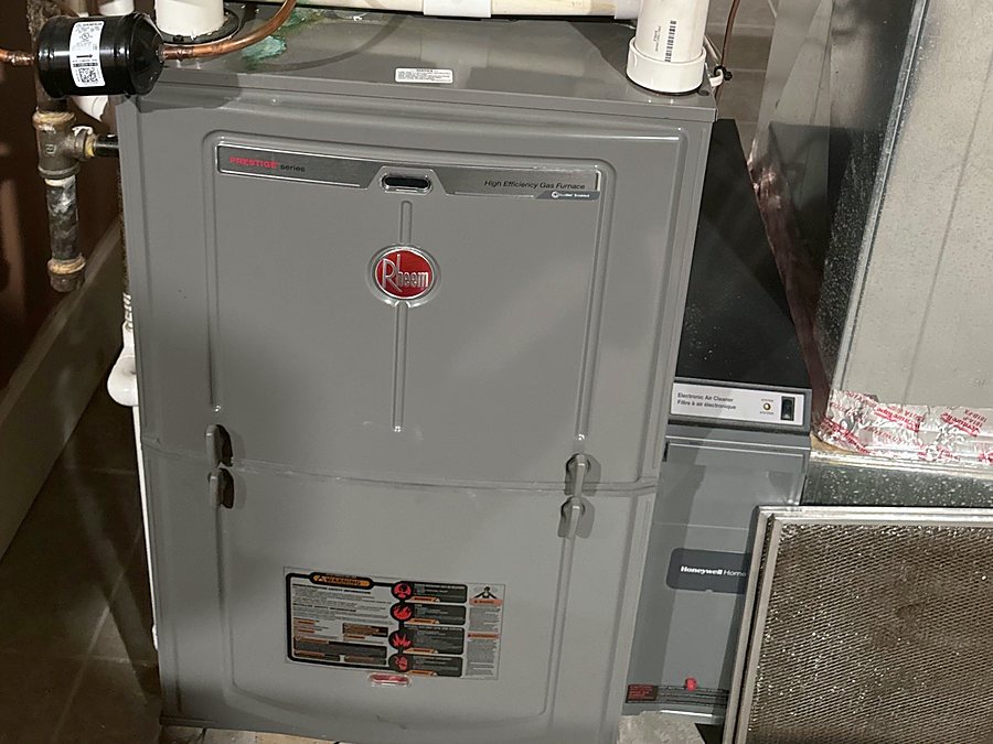 High-efficiency gas furnace installed in a basement