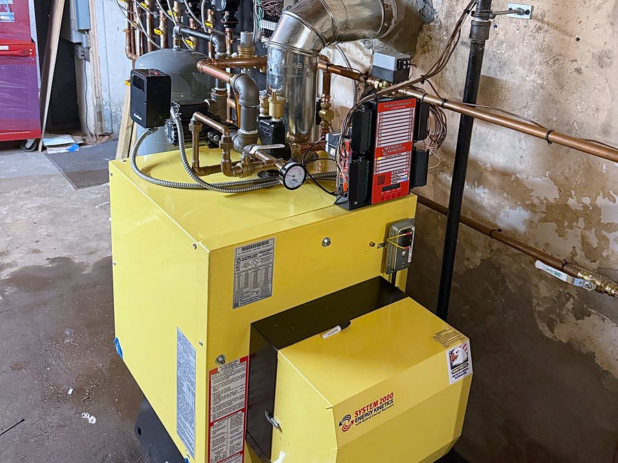 Yellow Energy Kinetics System 2000 boiler with a bank of zone circulators