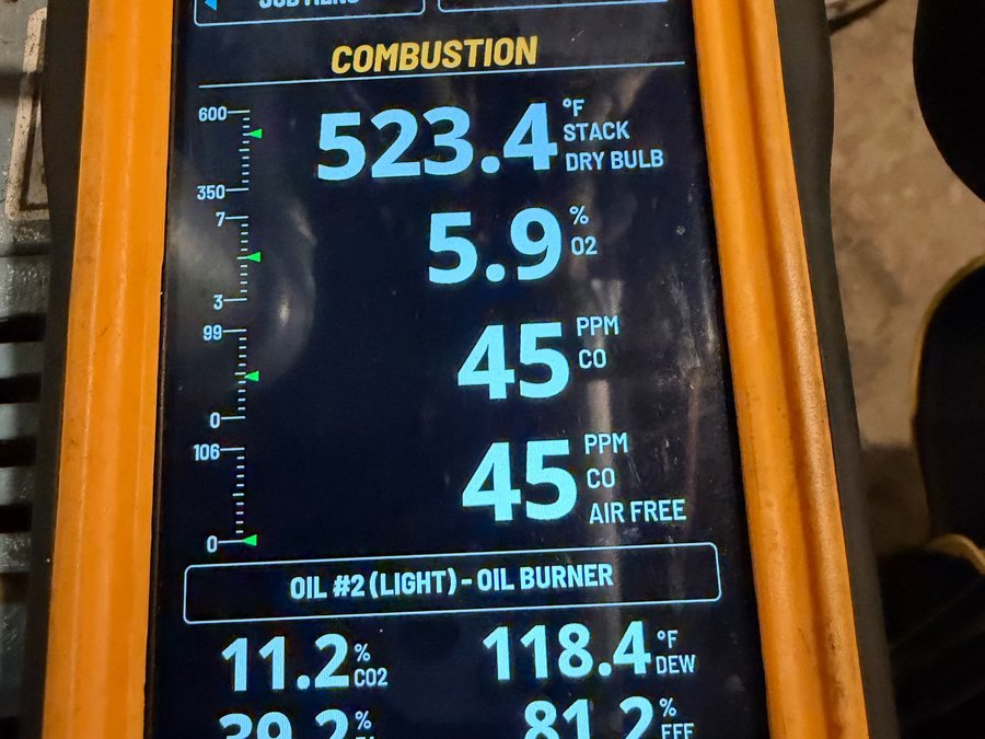 Combustion analyzer screen showing readings for an oil burner