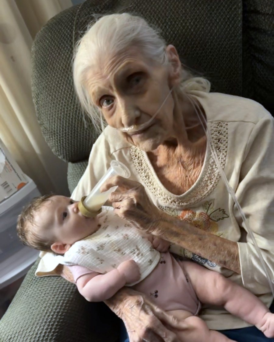 Susan feeding her great-granddaughter Kimberly