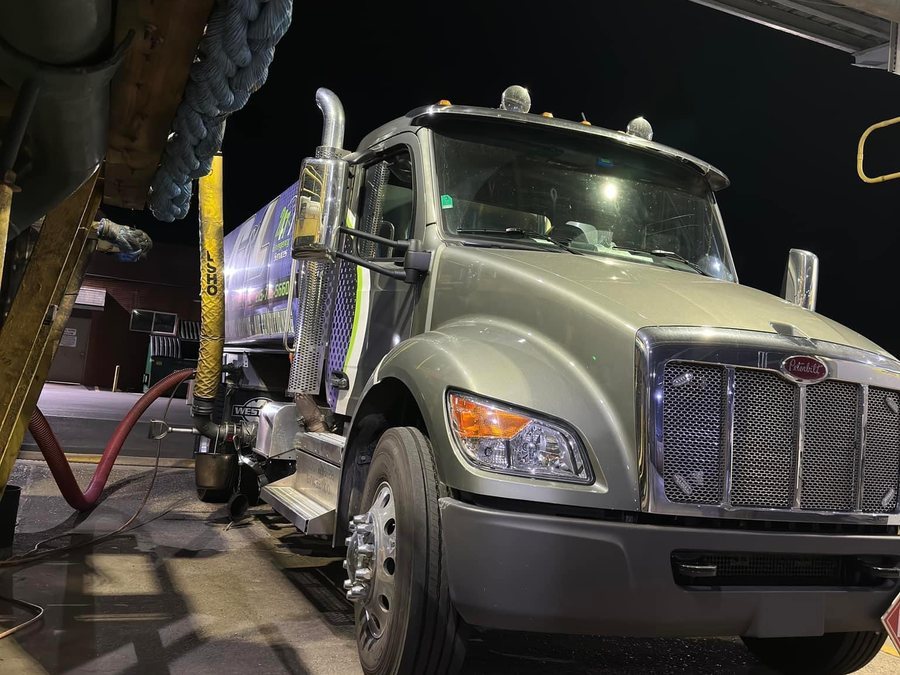 C&L Fuel oil delivery truck in the loading bay at night